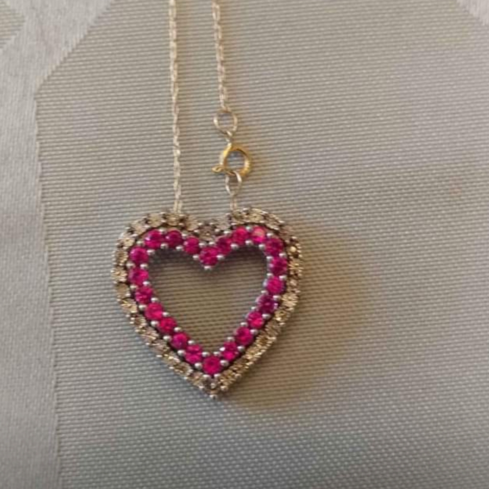 Silver heart with sapphires and gold chain